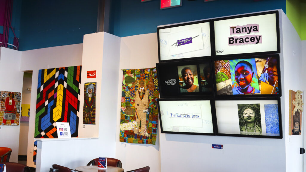 Artwork by black artists on display in the Harborplace pavilions