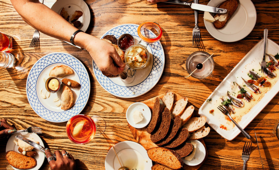Exterior of the National Aquarium seen from the harbor at night.