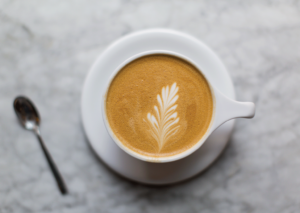 Justin Tsucalas A latte with floral art