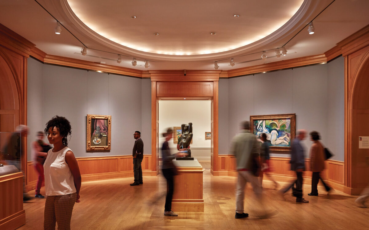 People looking at art inside of The Baltimore Museum of Art.