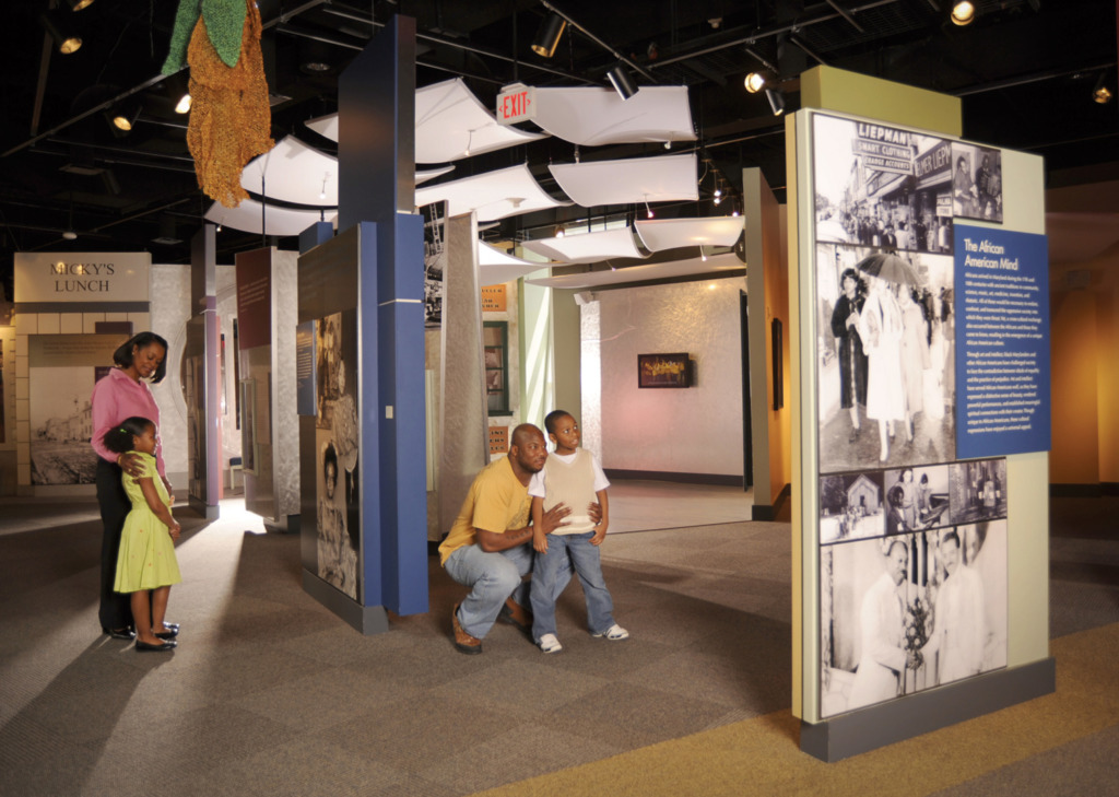 A family at the Reginald F. Lewis Museum of Maryland African American History & Culture