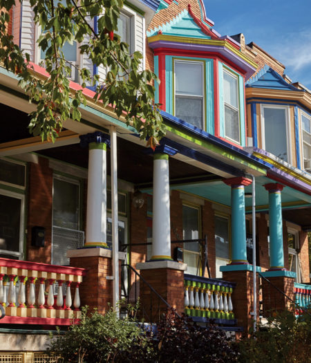 Porches from below of painted ladies in Baltimore.