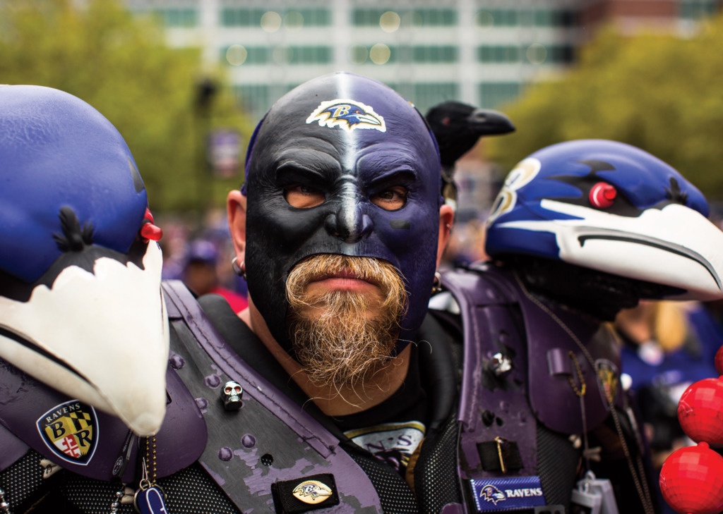 A Ravens fan in full gear heading into the game.
