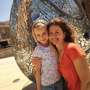 Mother and daughter in front of the Cosmic Egg at the American Visionary Art Museum.
