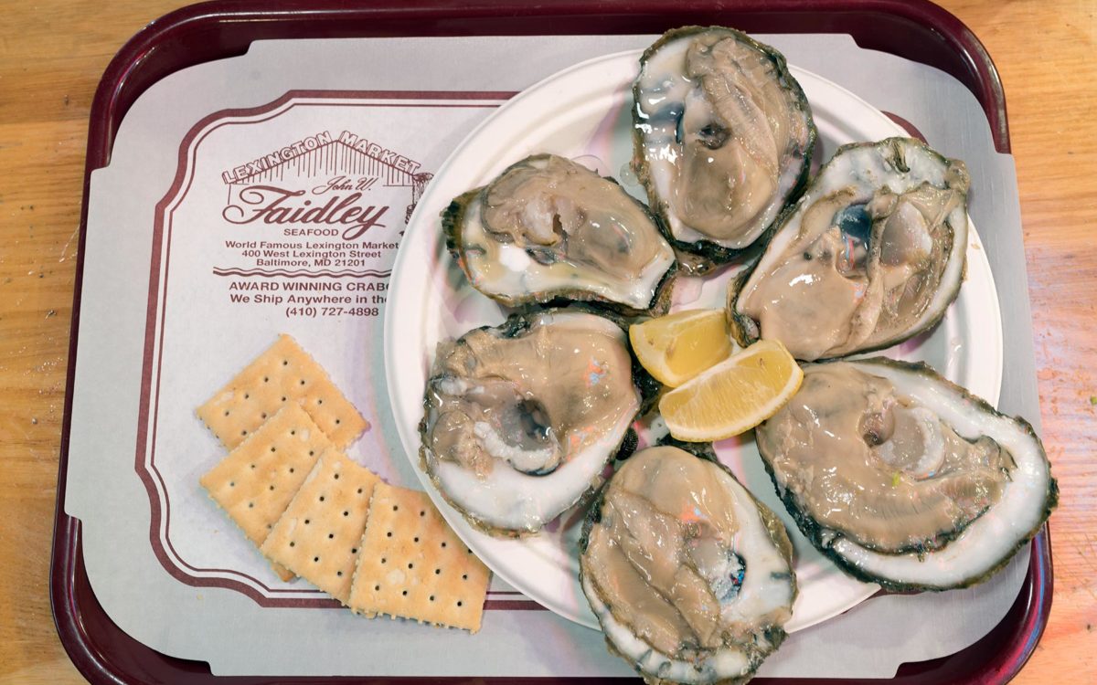 A raw oysters and crackers on a tray at Finleys in Baltimore.