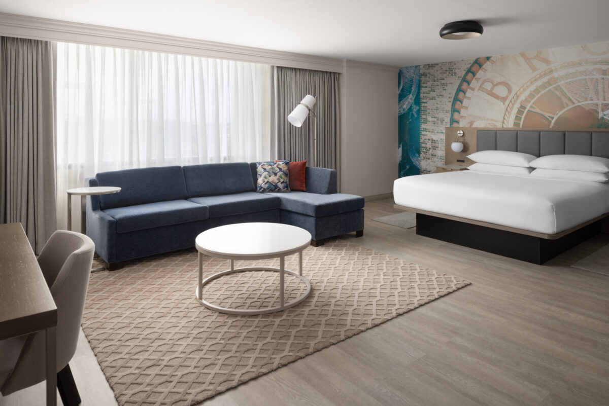 Newly renovated Executive King Room offers an elevated stay with contemporary design, enhanced comfort, and spacious accommodations. Featuring modern furnishings, plush bedding, luxury vinyl flooring, a workstation, 55-inch Smart TV with streaming, mini-refrigerator, coffee maker, and Wi-Fi.