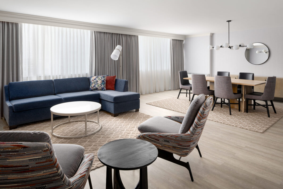The newly renovated Executive Parlor offers an elevated residential-style retreat featuring a spacious living area, contemporary furnishings, stylish dining space, and modern design elements. Perfect for entertaining or relaxing, this suite provides a comfortable setting with premium amenities.
