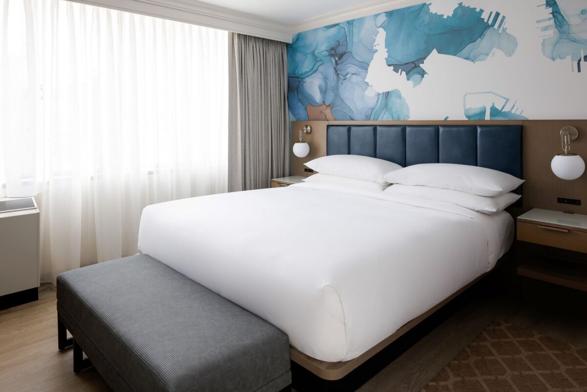 Experience elevated comfort in our Executive Parlor King Room, featuring a plush king bed, stylish lounge seating, a dedicated workspace, and contemporary furnishings. Thoughtfully designed with a sophisticated residential feel, the spacious room offers an inviting setting to relax, work, or unwind.
