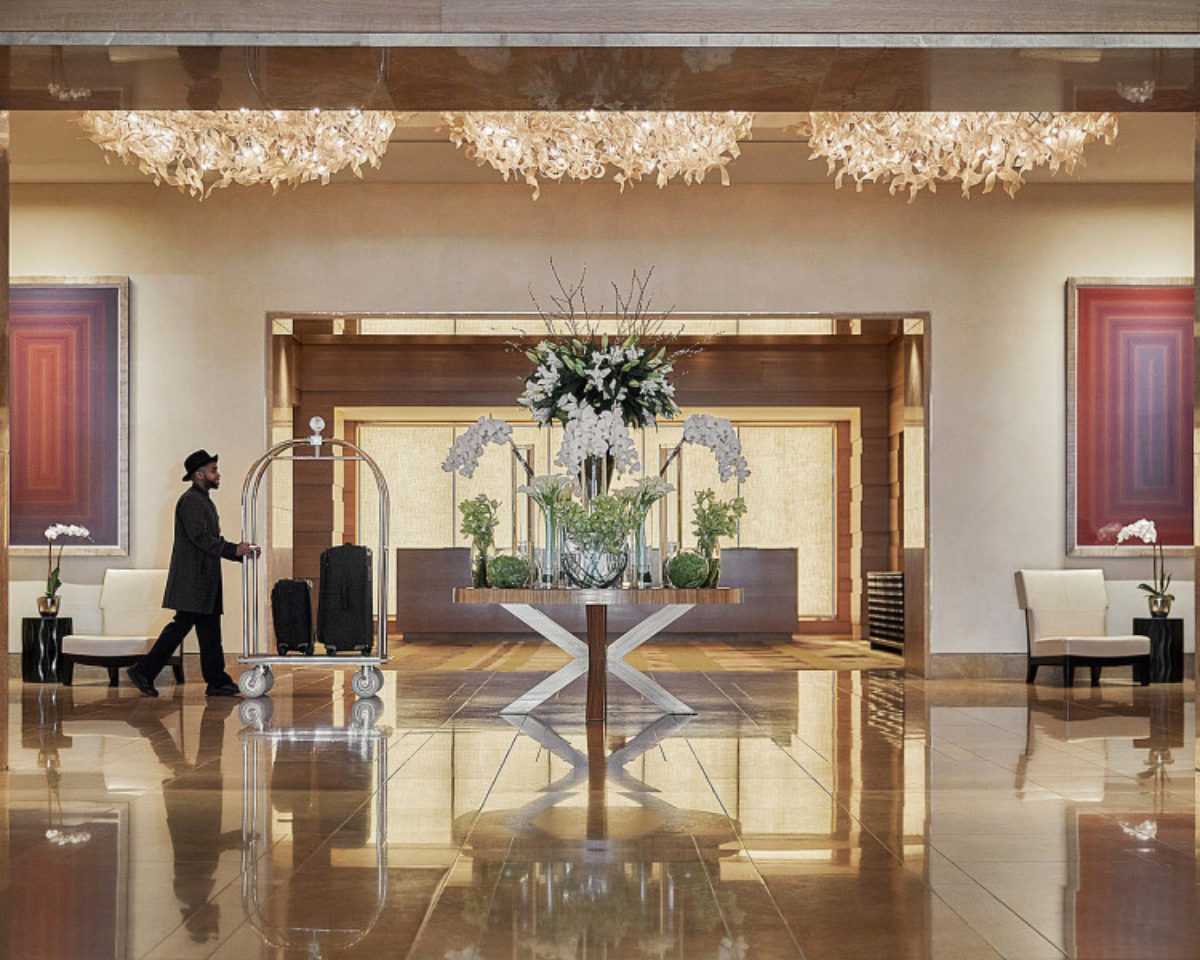 Lobby of Four Seasons Hotel Baltimore decorated with white flowers.