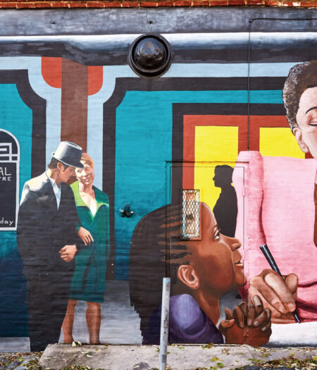 A mural of Billie Holiday is shown on the Royal Theater wall