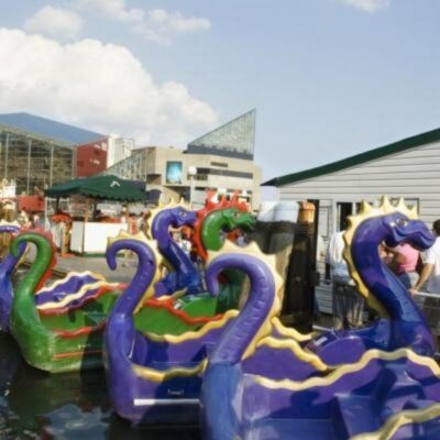 Chessie Paddle Boats and the Electric Boats, Pirate Ships of Baltimore, in Baltimore’s Inner Harbor