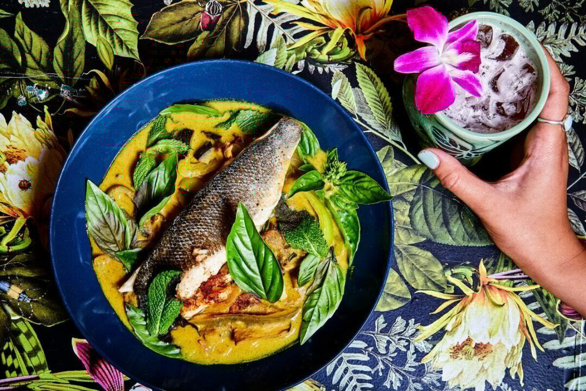 A fish dish and cocktail from Sally O's