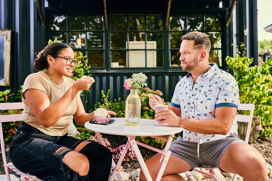 people eating snowballs outdoors