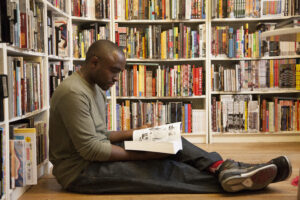 Customer reading at a bookstore