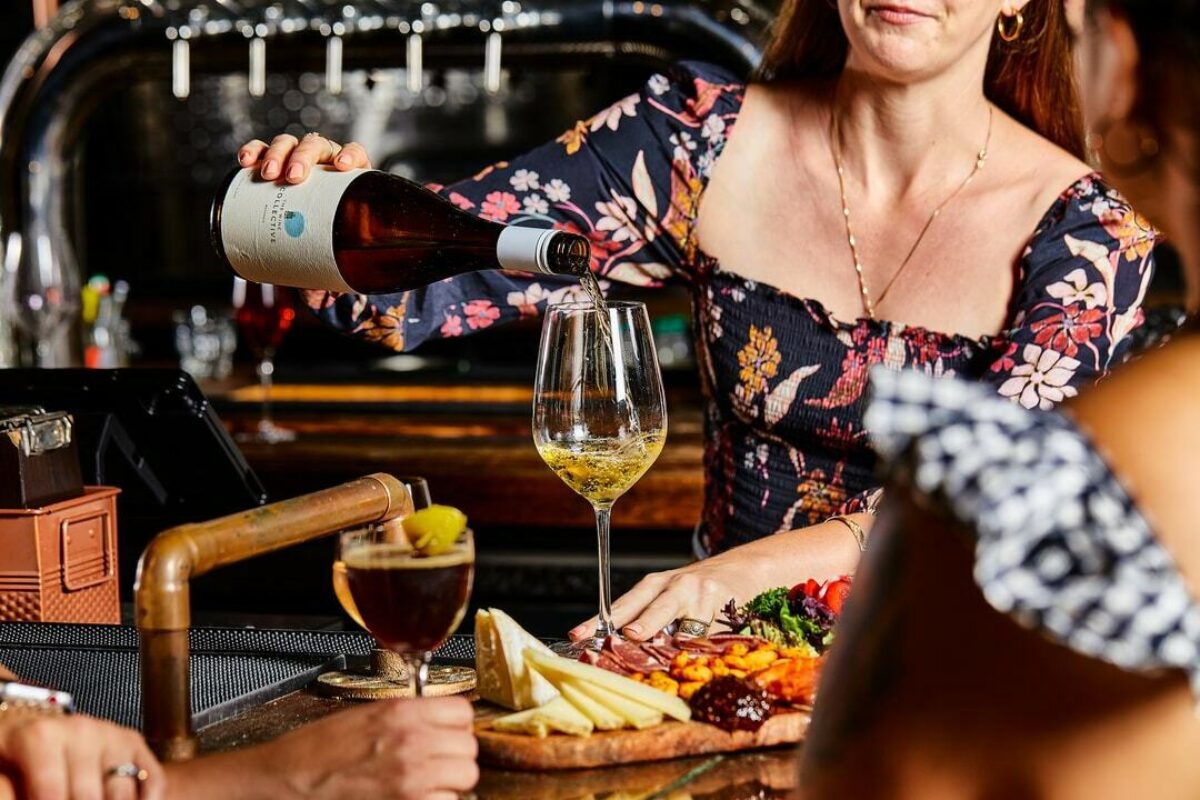 Woman pouring wine