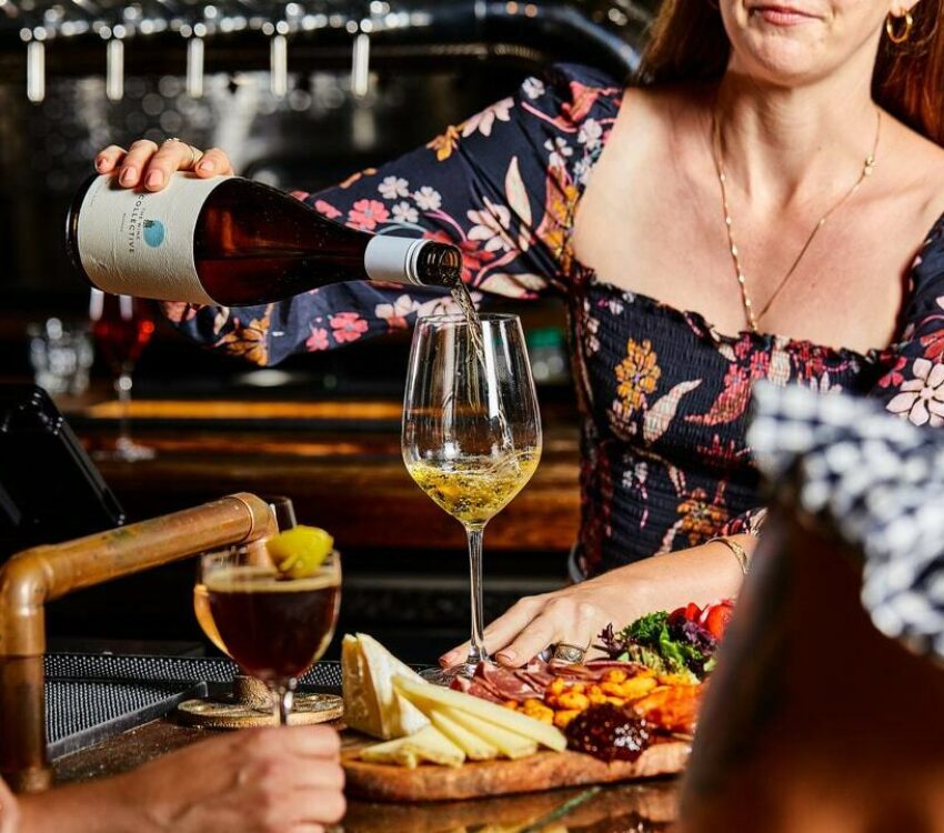 Woman pouring wine