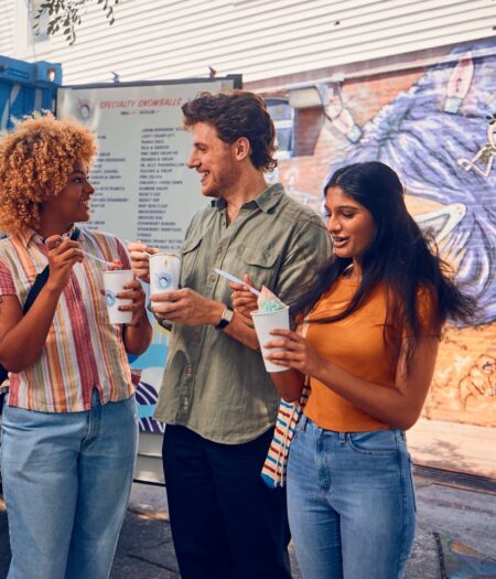 people eating snowballs