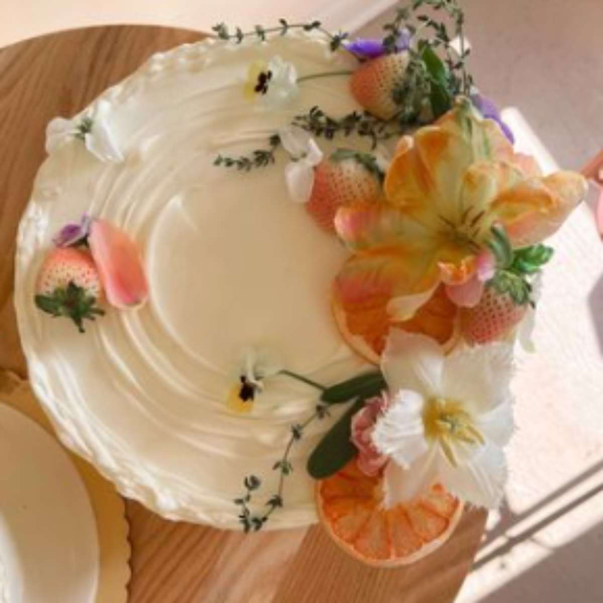 Cake Topped with Flowers from Bramble Baking Co.