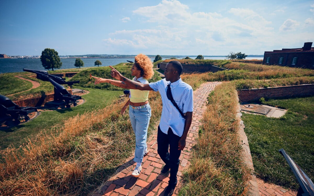 A young Black man and woman explore Fort McHenry