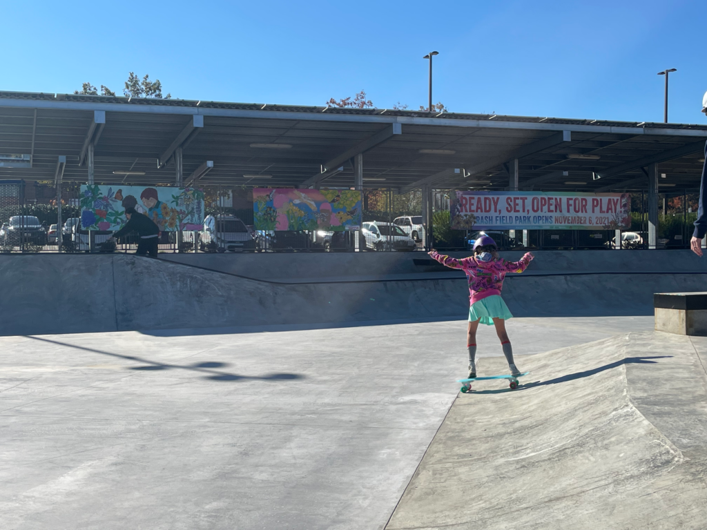 A young girl skates at Rash Field Park.