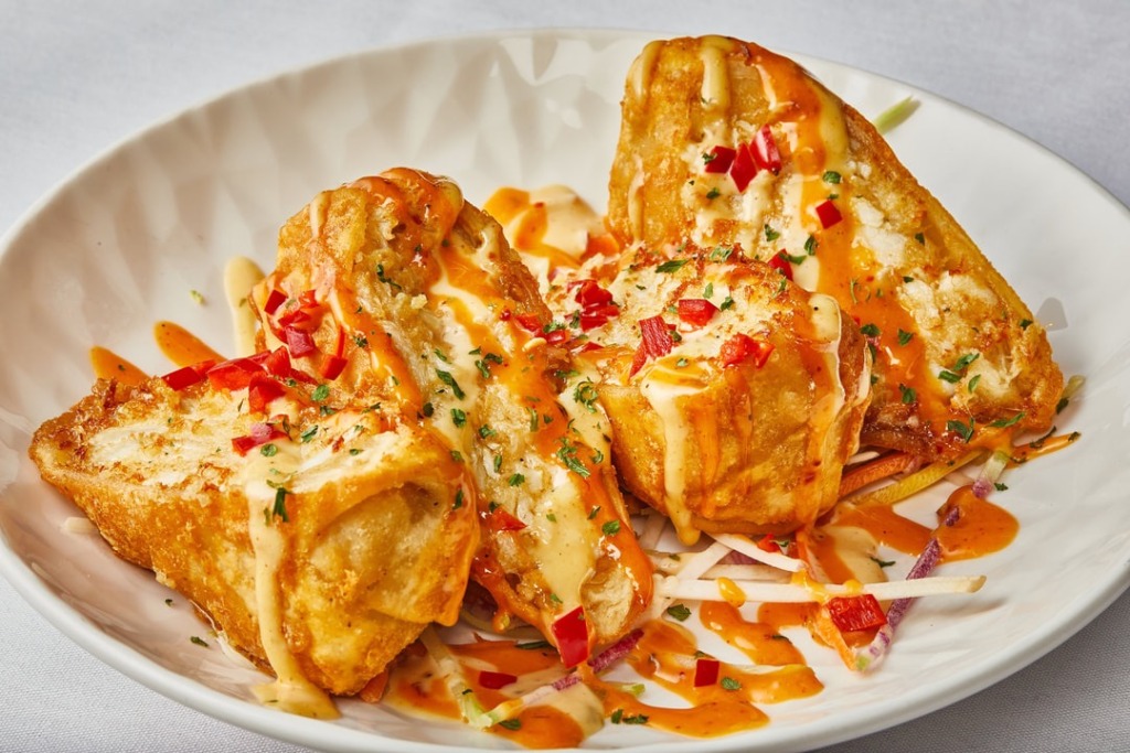 Crab egg rolls on a plate