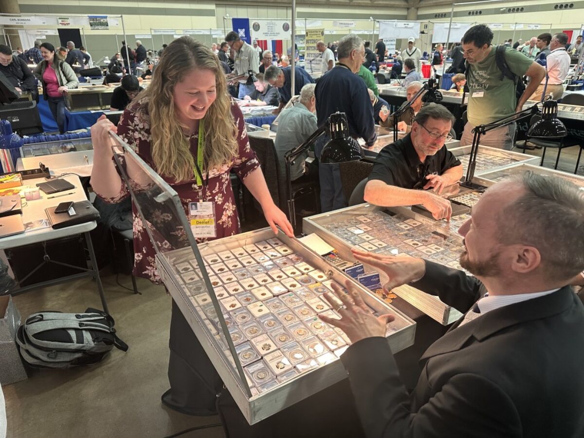 People shopping for rare coins