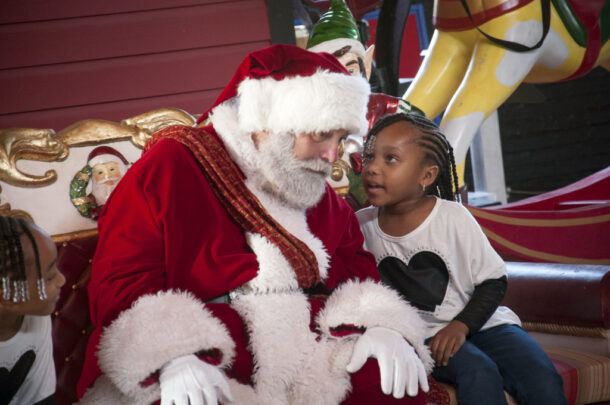 Child speaking to santa