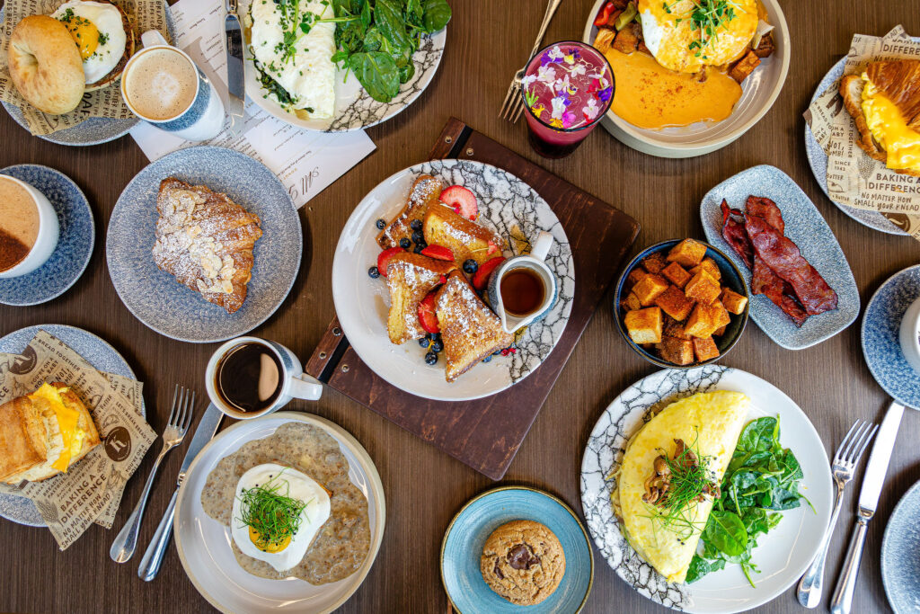 An aerial view of breakfast food items on a table