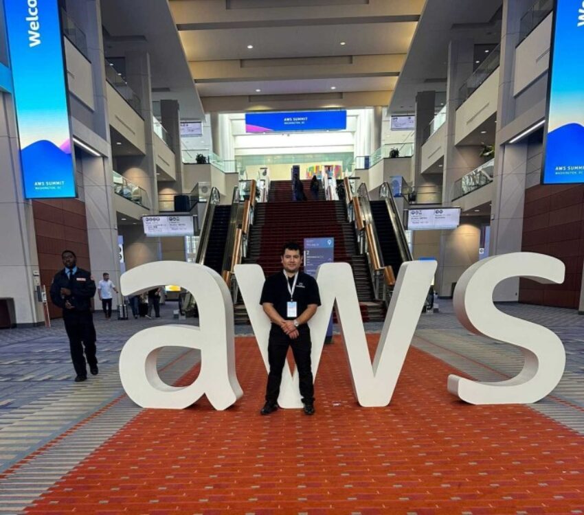 AWS logo with man in front of it