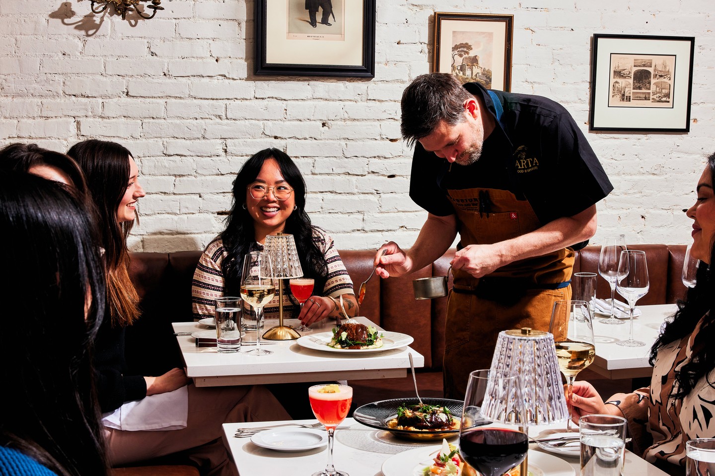 server serving food to people
