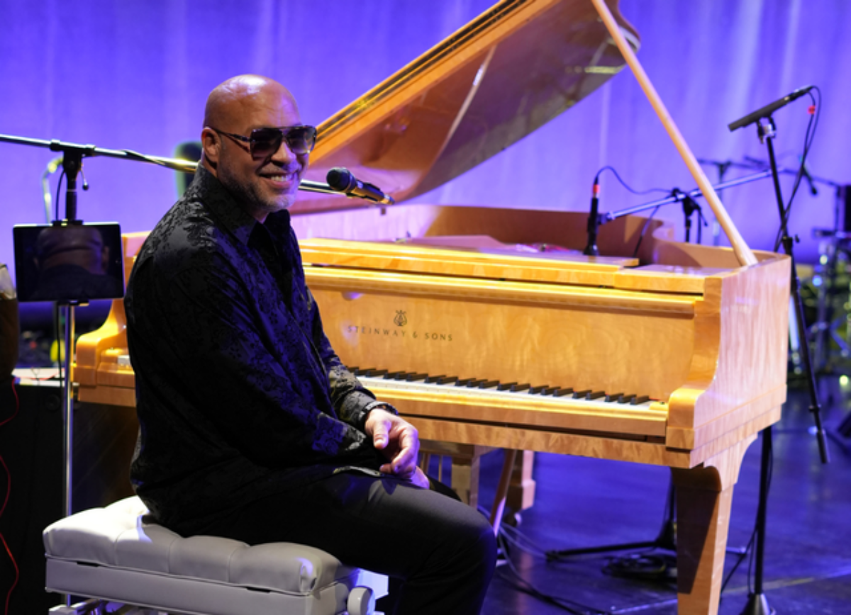 Frank McComb at a piano