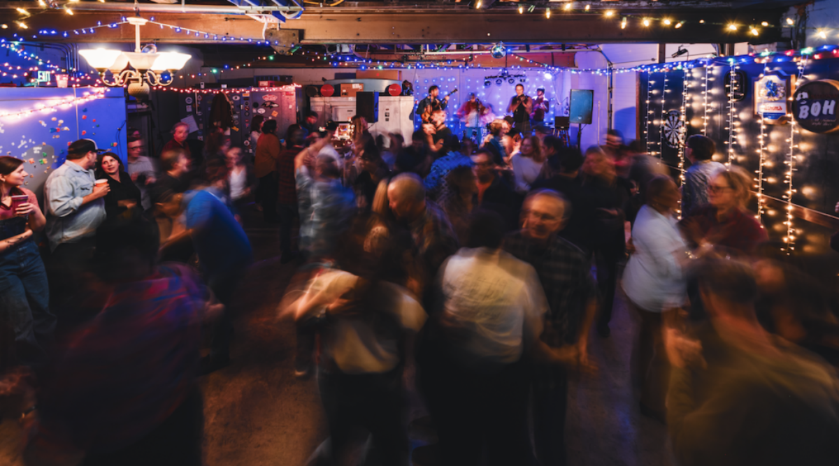 People dancing with a band