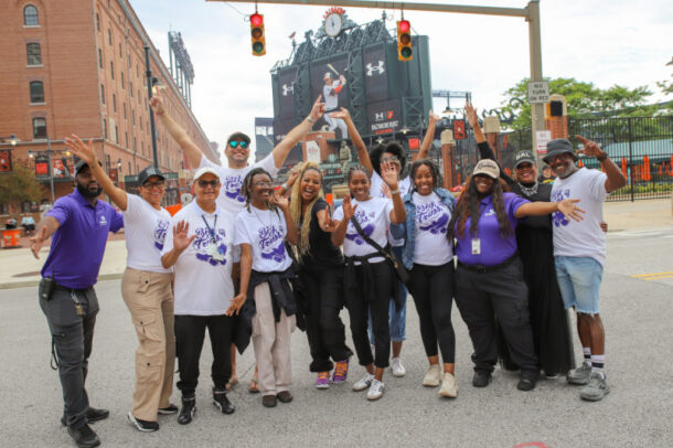 group of people in ravens gear